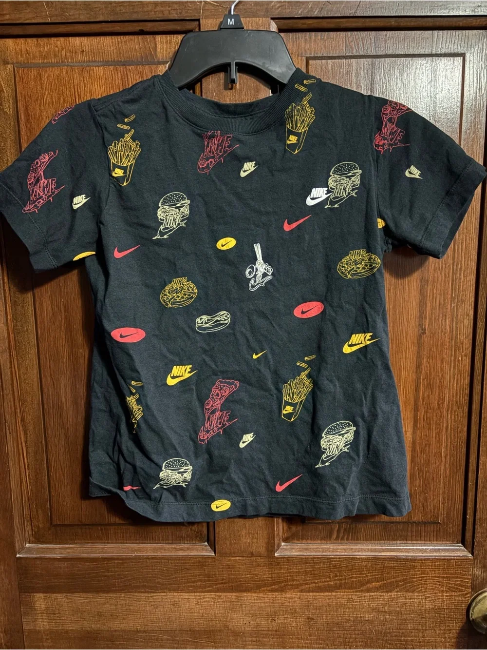 Nike Kids Black Tee with Red & Yellow graphics
